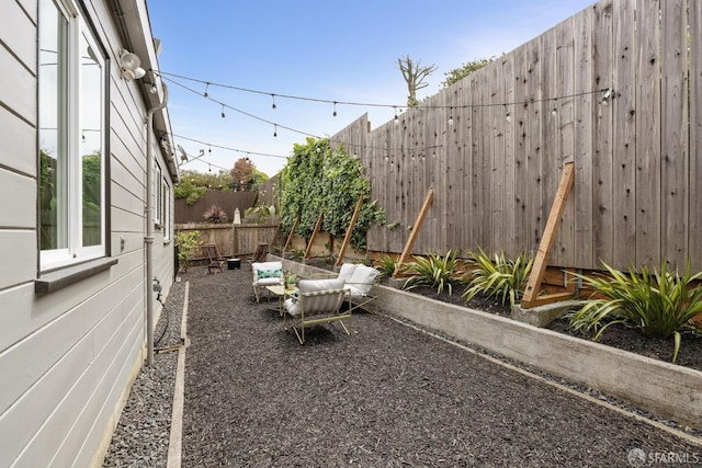 view of yard featuring a fenced backyard