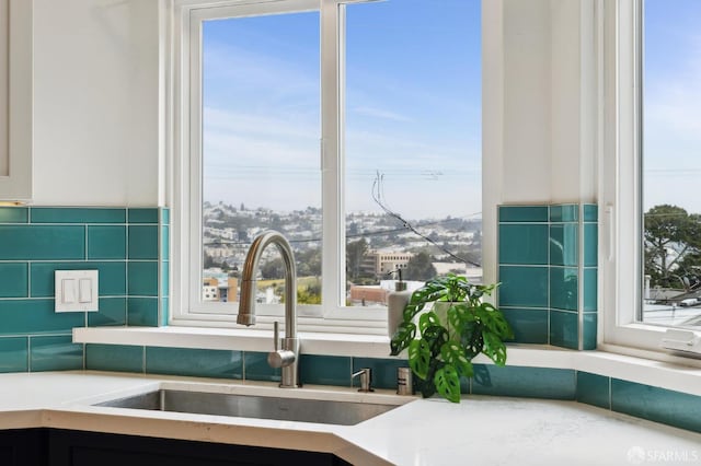 room details featuring a sink and light countertops