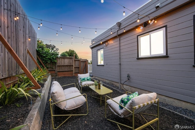 patio terrace at dusk with fence