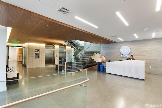 reception with visible vents and stairway