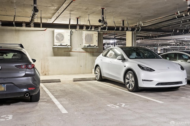 parking garage featuring ac unit