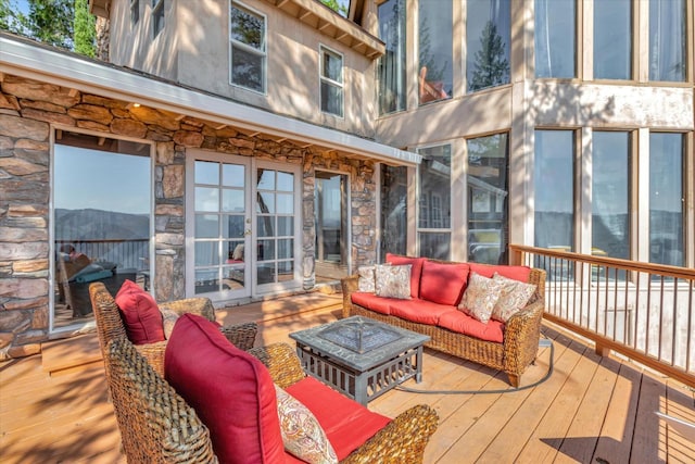 deck with an outdoor hangout area