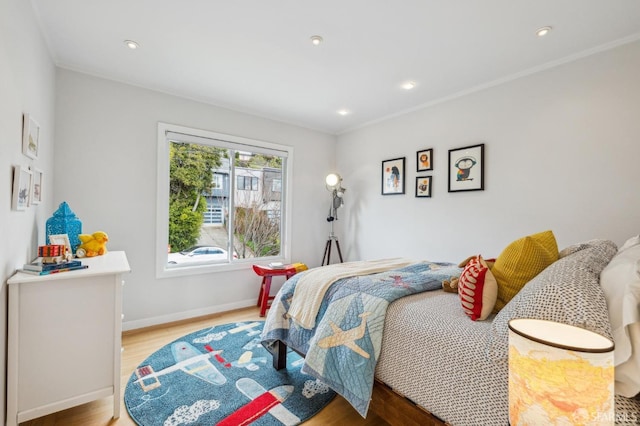 bedroom featuring light hardwood / wood-style floors