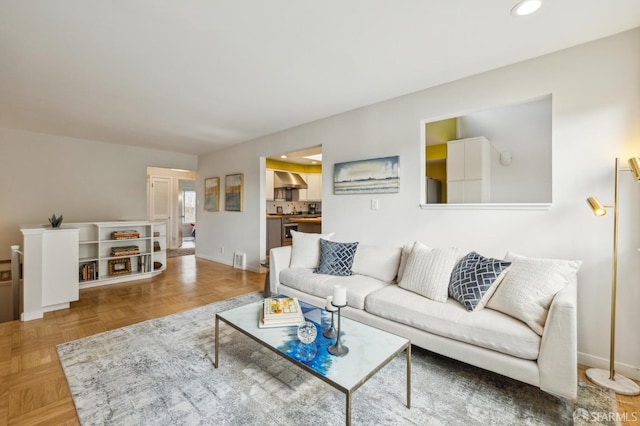 living room featuring light parquet flooring