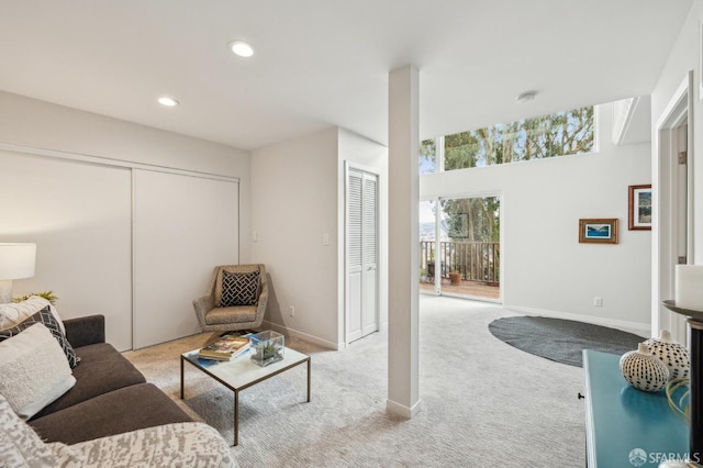 living room featuring light carpet