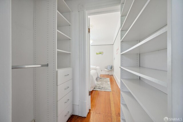 spacious closet featuring wood finished floors