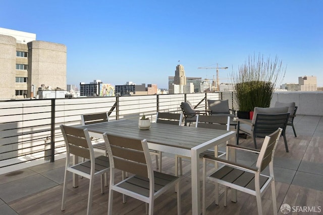 view of patio featuring a balcony