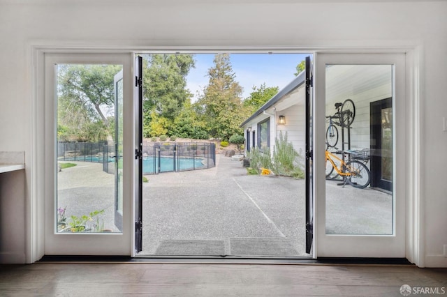 doorway to outside featuring wood finished floors