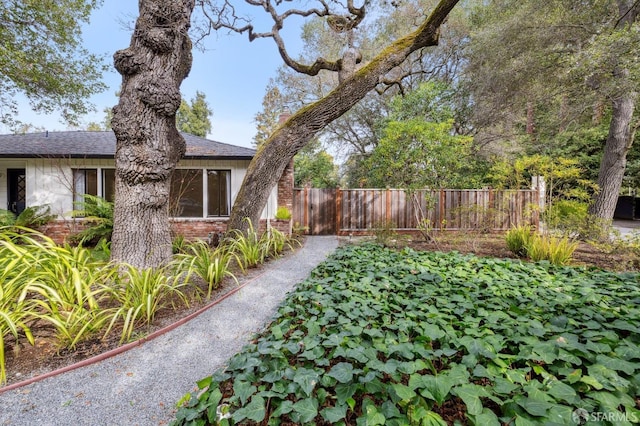 view of yard with fence