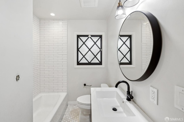 full bath featuring toilet, a sink, visible vents,  shower combination, and tile patterned floors