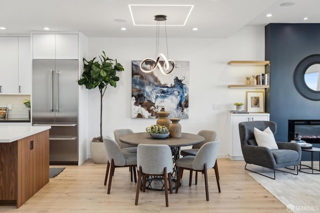 dining space featuring light hardwood / wood-style flooring