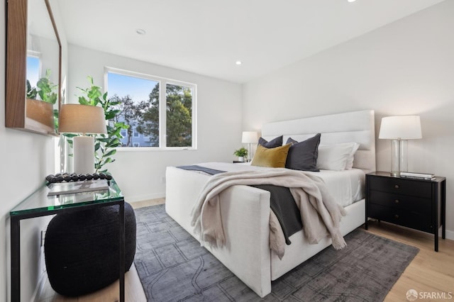 bedroom with wood-type flooring