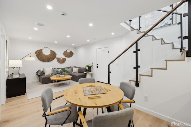 dining room with light hardwood / wood-style flooring