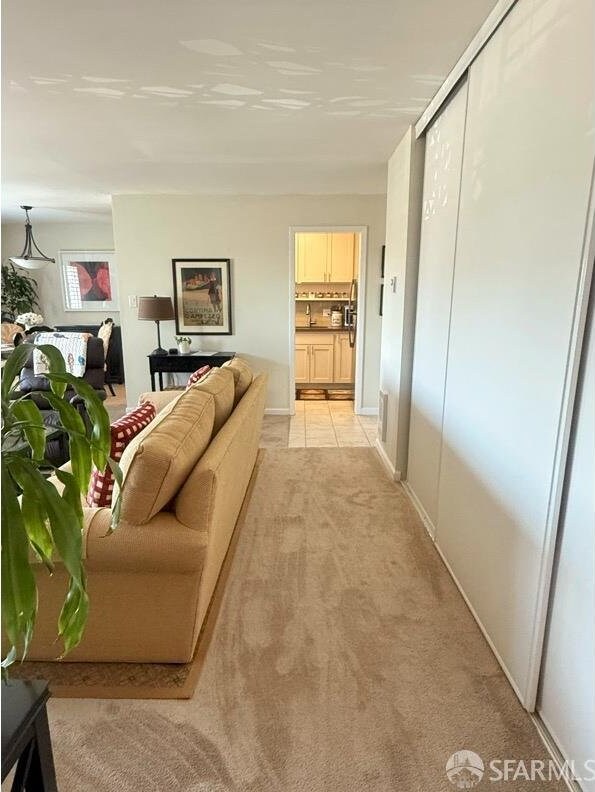 800 N Delaware St Unit 316, San Mateo, CA 94401 - living room featuring light carpet