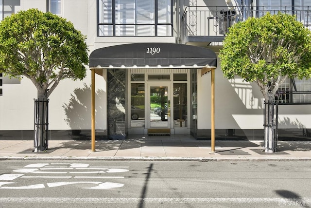 1190 Sacramento St Unit 6, San Francisco, CA 94108 - doorway to property featuring stucco siding