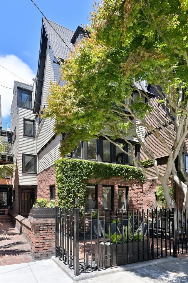 exterior space with a fenced front yard