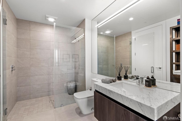 bathroom with vanity, toilet, recessed lighting, tile patterned floors, and a stall shower