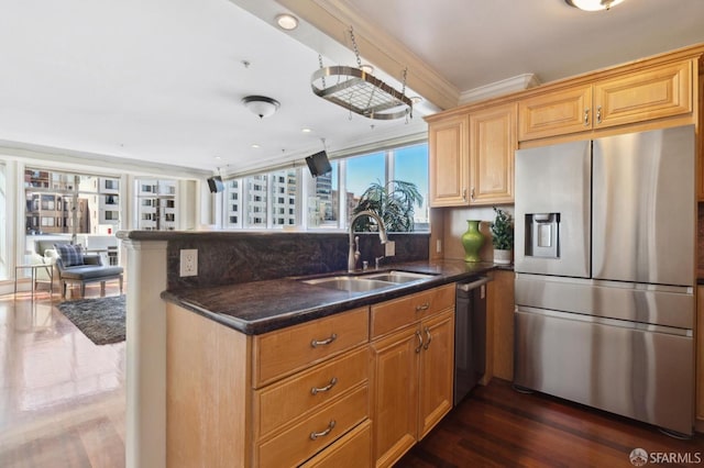 kitchen featuring sink, stainless steel refrigerator with ice dispenser, kitchen peninsula, crown molding, and dark hardwood / wood-style flooring