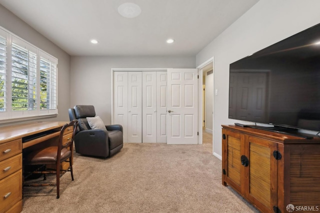 home office featuring light colored carpet