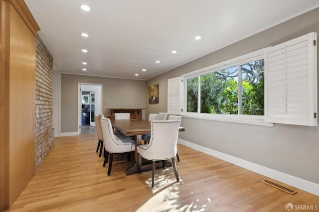 dining room featuring light wood-type flooring