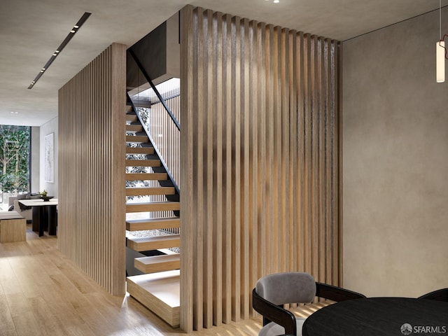 wine room with light wood-type flooring