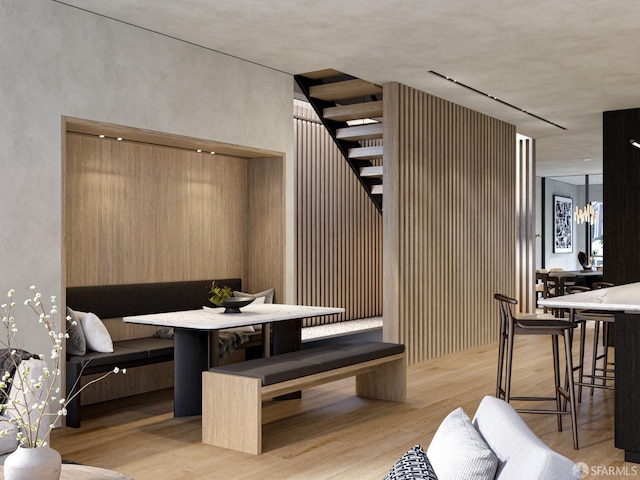 dining space featuring light wood-type flooring