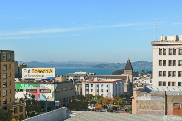 city view featuring a water and mountain view