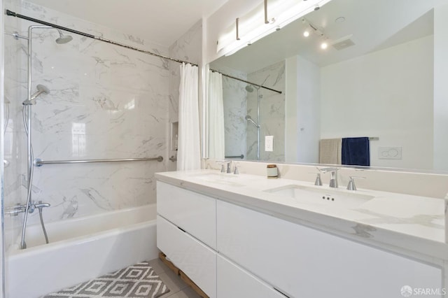 bathroom featuring vanity and shower / bath combo with shower curtain