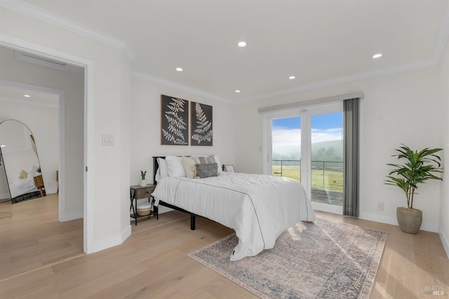 bedroom with access to exterior, ornamental molding, and light hardwood / wood-style flooring