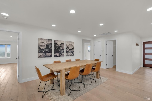 dining room with light wood-type flooring