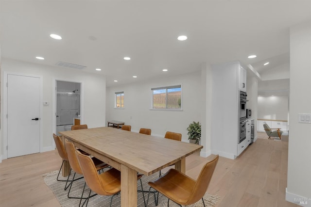 dining room with light hardwood / wood-style floors