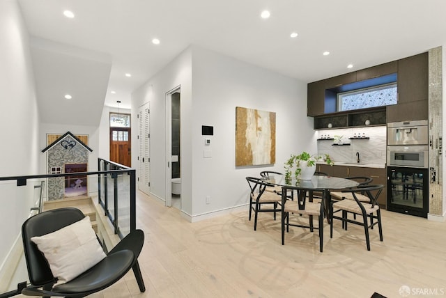 4038 18th St, San Francisco, CA 94114 - dining room featuring wine cooler, recessed lighting, and light wood finished floors
