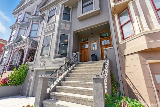 4038 18th St, San Francisco, CA 94114 - doorway to property with covered porch and a garage