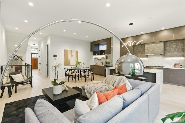 4038 18th St, San Francisco, CA 94114 - living area featuring recessed lighting, arched walkways, and light wood-style floors