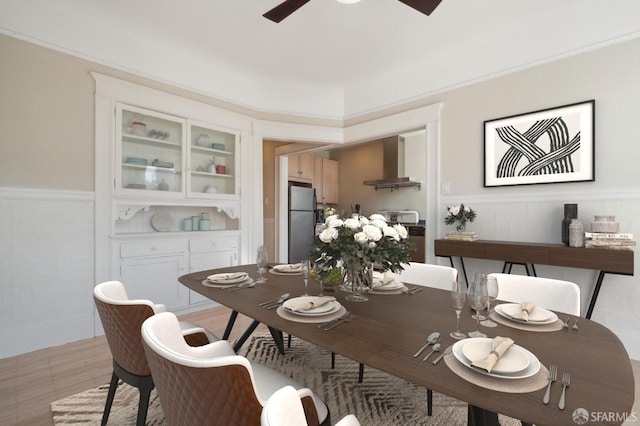 dining space featuring light hardwood / wood-style flooring and ceiling fan