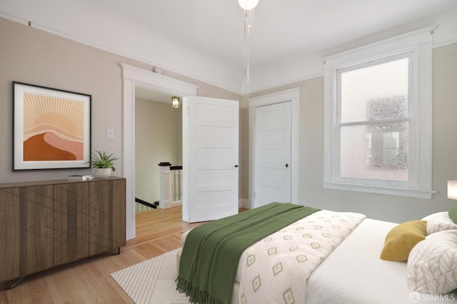 bedroom with light wood-type flooring