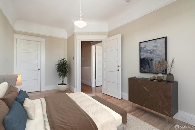 bedroom with light hardwood / wood-style flooring