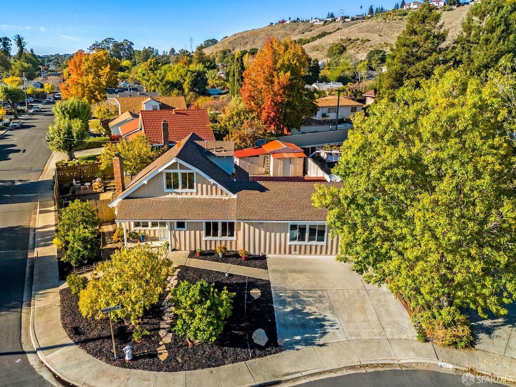 birds eye view of property with a mountain view