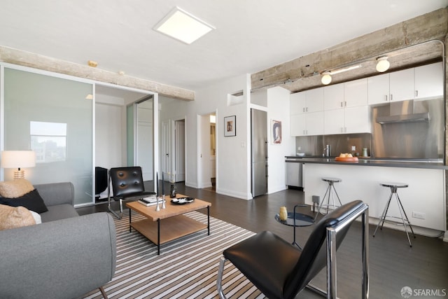 living room with dark hardwood / wood-style floors