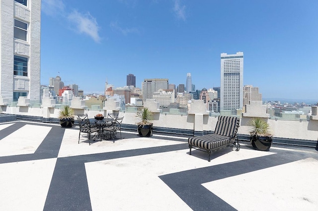 view of patio / terrace with a balcony