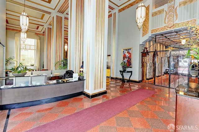 welcome area with a notable chandelier