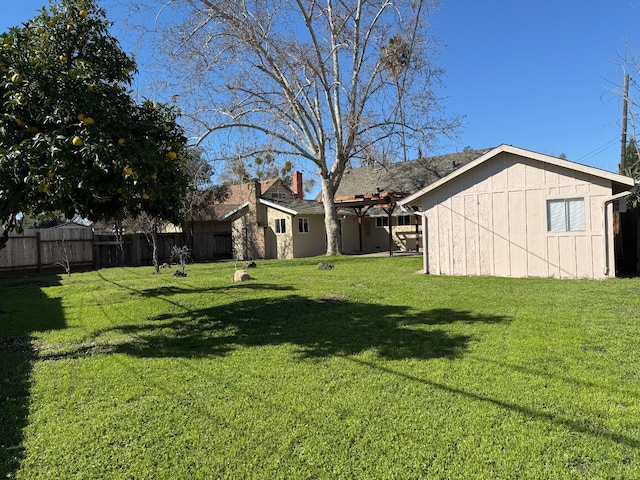 view of yard with fence