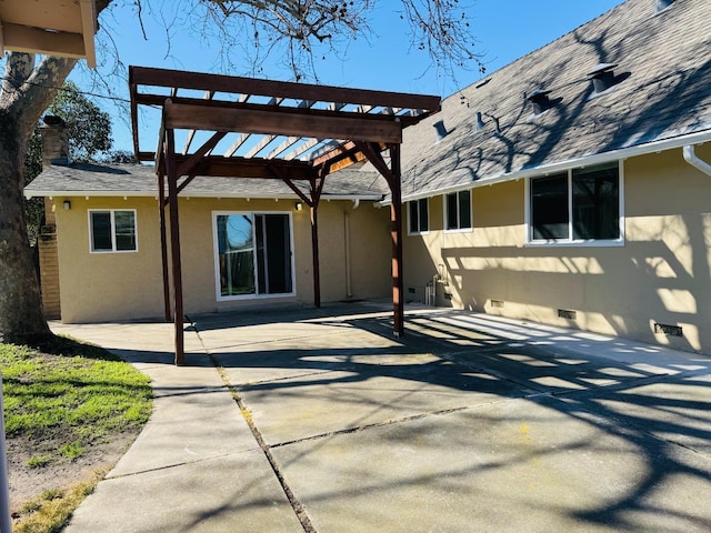 exterior space with a patio, a shingled roof, crawl space, stucco siding, and a pergola