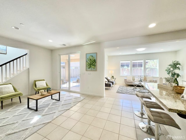 living room featuring light tile patterned floors