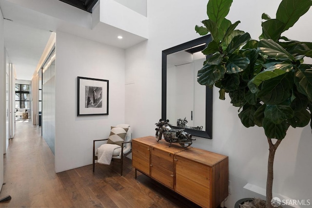 hall with dark hardwood / wood-style floors