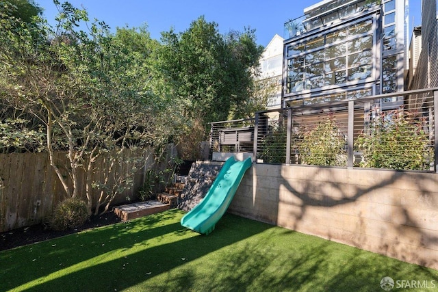 view of play area featuring a yard