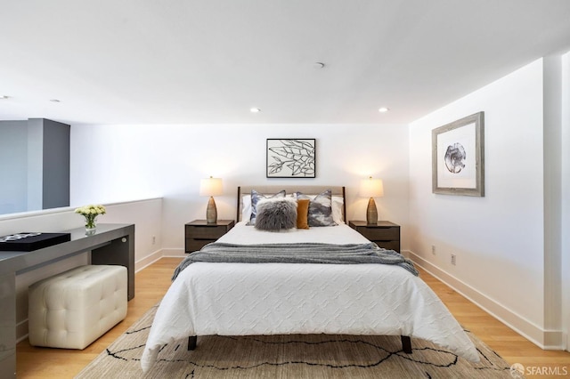 bedroom featuring light wood-type flooring