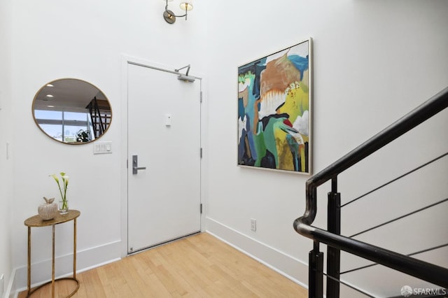 entrance foyer with light wood-type flooring