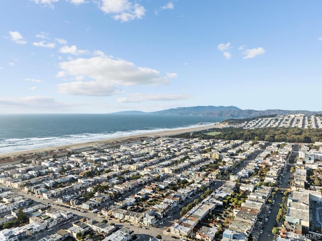 bird's eye view with a beach view and a water view