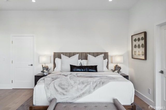 bedroom featuring hardwood / wood-style flooring